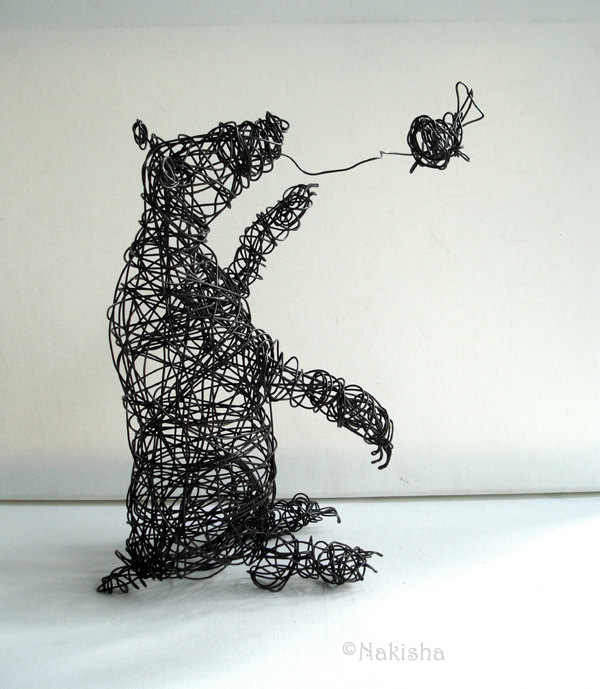 Almost Caught - Wire Sculpture by Nakisha